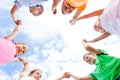 Bottom view of kids hands forming circle Royalty Free Stock Photo