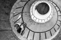 Bottom view of little girl standing on a spiral staircase - Specific learning disorders concept - Childhood difficulties concepts