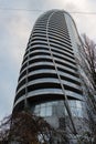 Bottom view of modern skyscrapers in business district against blue sky Royalty Free Stock Photo