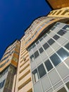 Bottom View Of A New High-rise Building Against The Blue Sky. Vertical. Noyabrsk, Russia