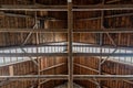 Timbers and beams in an old barn. Wooden roof coverage. Royalty Free Stock Photo