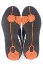 Bottom view of a pair of athletic sports shoes