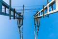 Bottom view of railway traction line towers Royalty Free Stock Photo