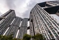 Bottom view of real estate housing in down town of Singapore, skyscraper at cloud weather Royalty Free Stock Photo