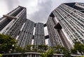 Bottom view of real estate housing in down town of Singapore, skyscraper at cloud weather Royalty Free Stock Photo