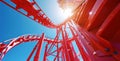 Bottom view of red rides in an amusement park in a sunny bright day Royalty Free Stock Photo