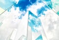 Bottom view of reflection of blue sky on building mirror. Abstract background. Royalty Free Stock Photo