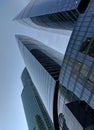 Bottom view on skyscrapers and blue sky. Modern office buildings