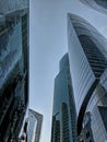 Bottom view on skyscrapers and blue sky. Modern office buildings