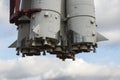 Bottom view of space rocket nozzles on sky background