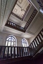 Bottom view of the square staircase perspective Royalty Free Stock Photo