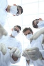 Bottom view.surgical team at work Royalty Free Stock Photo