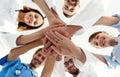 Bottom view.a team of doctors at the medical center clasped their hands together Royalty Free Stock Photo