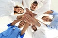 Bottom view.a team of doctors at the medical center clasped their hands together Royalty Free Stock Photo