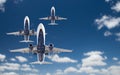 Bottom View of Three Passenger Airplanes Flying In The Blue Sky