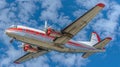 Bottom view - twin prop cargo plane on sky background Royalty Free Stock Photo