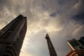 Bottom View Upper Storeys of Skyscrapers against Grey Clouds