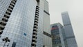 Bottom view of various international business centers, modern architecture. Action. Skyscrapers in Financial District of