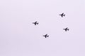 Four, french, fighter jets, flying in formation, streaming red, orange, blue and pink smoke