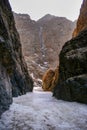 Bottom of the Yolyn Am or Yoliin Am canyon ice field in spring,  Gobi Gurvansaikhan National Park. Gobi desert, Mongolia Royalty Free Stock Photo