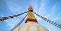 Boudhanath stupa, eyes, prayer flags, blue sky, Kathmandu, Nepal Royalty Free Stock Photo