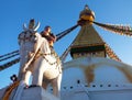 Boudhanath stupa with prayer flags and statue Kathmandu Royalty Free Stock Photo