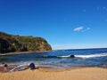 Boudi national park beach with blue clear sky surrounding sea and lots of greenness Royalty Free Stock Photo