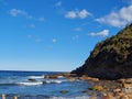 Boudi national park beach with blue clear sky surrounding sea and lots of greenness