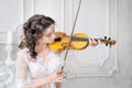 Woman with violin in white peignoir. Boudoir. seductive Royalty Free Stock Photo