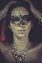 Boudoir, sensual masked woman, venetian mask, brunette young