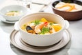 bouillabaisse in a bowl with seafood and rouille sauce