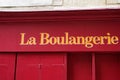 Boulangerie french sign means bakery old vintage on street outside view of rustic text on wall wooden facade Royalty Free Stock Photo