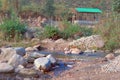 Boulder Rocks in the middle of a mountain river. Tabakoshi Rangbang river mountain valley Mirik West Bengal India Royalty Free Stock Photo