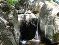 A Boulder Waterfall Falling into a Pond Royalty Free Stock Photo