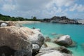 Boulders, beach and azure waters Royalty Free Stock Photo