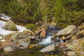 Boulders and cascades of the Tristaina river Royalty Free Stock Photo