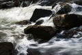 Boulders in the fast water of the river Royalty Free Stock Photo
