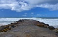 Boulders serve as a breakwall to protect Kings beach Royalty Free Stock Photo