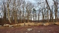 Boulders and Tree Stumps Forming Natural Barrier in Nature Site Parking Area