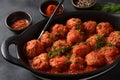 Boulettes de Poisson, Fried Fish Balls in Tomato Sauce in a white dish Royalty Free Stock Photo