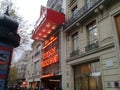 Boulevard des Capucines with its buildings, shops, event venues in the tourist city of Paris Royalty Free Stock Photo