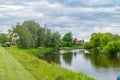 Boulevards on Narew river at cloudy day in Lomza