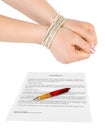 Bound hands and contract Royalty Free Stock Photo