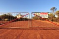 Boundary gate and road with closed sign Royalty Free Stock Photo