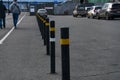 Boundary posts in the parking lot, pedestrian zone. Royalty Free Stock Photo