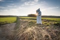 Boundary stone at the national border with sun star