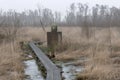 Boundary stone in nature reserve the Wooldse veen in Winterswijk