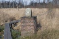 Boundary stone in nature reserve the Wooldse veen in Winterswijk in the Netherlands.