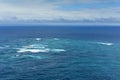 Boundary where the Tasman Sea meets the Pacific Ocean at Cape Reinga in New Zealand