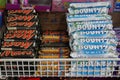 Bounty, Snickers, Mars Bars chocolates candy bar displayed on a shelf inside a supermarket. Chocolate Sweets For Sale On Royalty Free Stock Photo